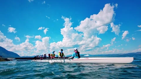 Rowing Boat racing in Competition along Coast with Aerial Drone. Stock Footage 324890666