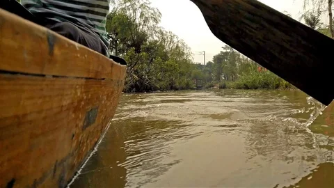 Rowing a boat on river 4K Stock Footage 70302273