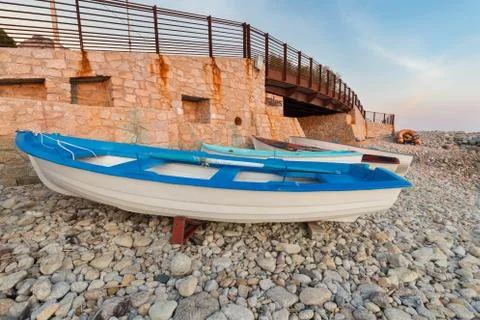 Rowing boat at sunset Stock Photos