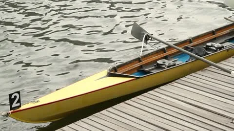 Rowing boat tied to a pier Stock Footage 10794893