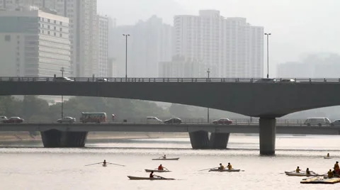 Rowing boat under the two bridges Stock Footage 881664