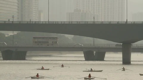Rowing Boat Under the two bridges Stock Footage 906112