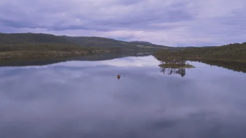 Rowing on a calm lake Stock Footage 79471582