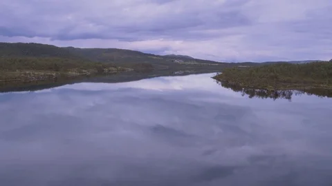 Rowing on a calm lake Stock Footage 79472724