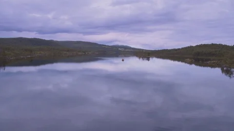 Rowing on a calm lake Stock Footage 79473034