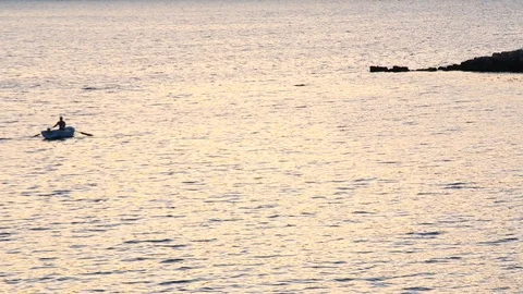 Rowing on Calm Sea in Sunset  動画素材 109671768