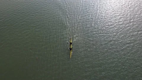 Rowing competition team training at Lake Sermo Kulon Progo 動画素材 214541663