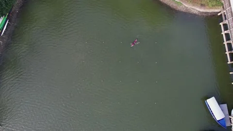 Rowing competition team training at Lake Sermo Kulon Progo Stock Footage 214545333
