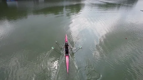 Rowing competition team training at Lake Sermo Kulon Progo Stock Footage 214551677