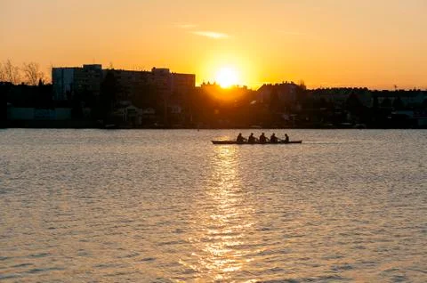 Rowing in the dusk Stock Photos