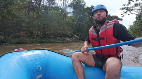 Rowing Inside a Blue Inflatable Raft 動画素材 329528869
