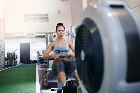 The rowing machine aka the fat blaster Stock Photos