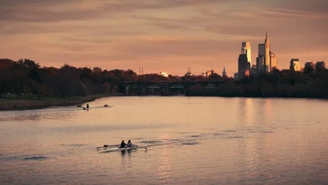 Rowing Rowers Crew on river Philadelphia skyline slow motion Aerial Drone sunset Stock-Footage 255250807