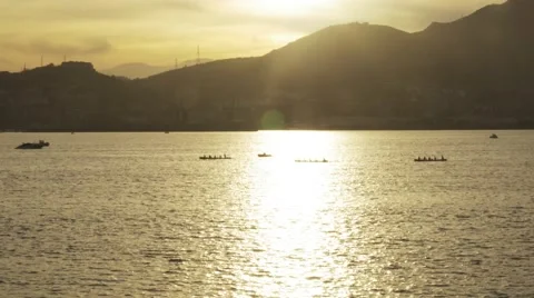 Rowing in the sea at sunset Video stock 47918797