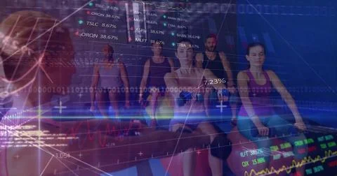 Rowing six exercisers in sportswear pulling on rowing machines at gym, with Stock Photos