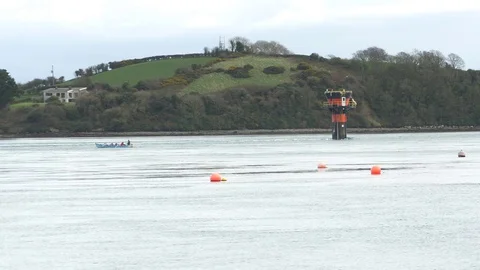 Rowing Skiff Catches Fast Estuary Tide Strangford Lough Northern Ireland Video stock 73220714