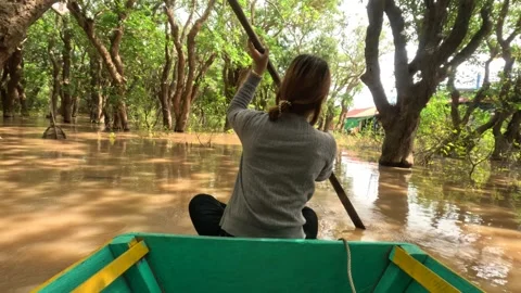 Rowing Small Wooden Boat Through Kampong Phluk Flooded Mangrove Forest Stock Footage 343691831