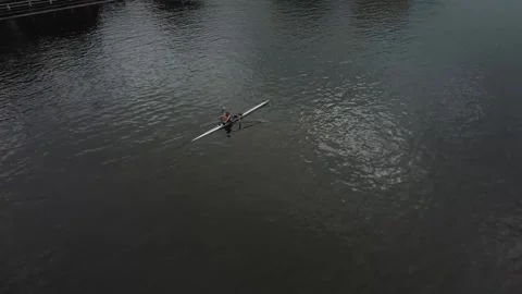 Rowing Solo on a Calm River in Gent, Belgium Stock Footage 279379719