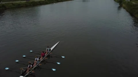 Rowing Team Practices on a Calm River in Gent, Belgium Stock Footage 279379610