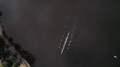 Rowing team practices on a river in the early morning Stock-Footage 327801903