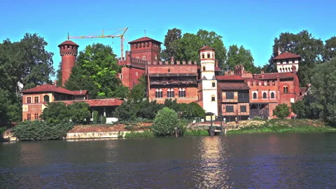 Rowing training in front of the medieval village in the Valentino park Stock Footage 207013746
