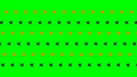 Rows of alternating orange and black chevron arrows on a green background Stock Footage 340903134