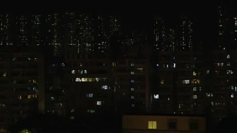 Rows of apartment at night, dark, shining windows Stock Footage 295924237