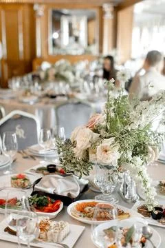 Rows of appetizers and starters on the wedding table Stock Photos