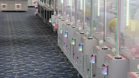 Rows of arcade claw games at arcade 4k Stock Footage 342371705