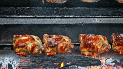 Rows of Authentic Peruvian Rotisserie Chicken Roasting on a Spit Stock-Footage 341440845