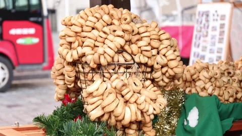 Rows of bagels at festive booth, heritage flavor reflects cozy culture, her.. Stock Footage 320738855