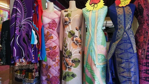 Rows of batik cloth on display at a local shopping outlet in Kuala Terengganu. 스톡 동영상 106067894