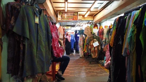 Rows of batik cloth on display at a shopping outlet in Terengganu, Malaysia. Stock Footage 106070767