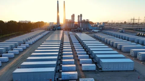 Rows of Battery Storage Units (BESS) at Moss Landing Power Plant During Sunset Stock Footage 320223431