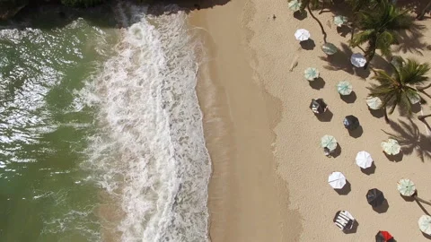 Rows of beach parasols at the beach. Stock Footage 136756377