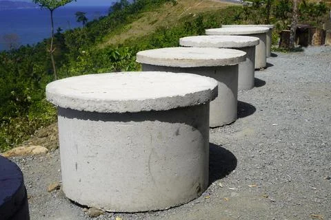 Rows of benches made of cast cement in the rest area  Stock-Fotos