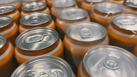 Rows of Beverage Cans Close Up Wide Angle Motion Blur | Aluminum Drink Can Tops Stock Footage 345692606