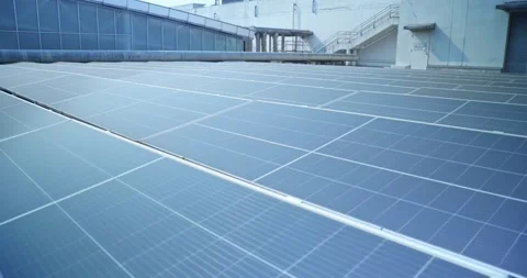 Rows of blue solar panels installed on a rooftop Stock Footage 304568820