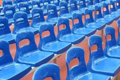 Rows of blue stadium seats Stock Photos
