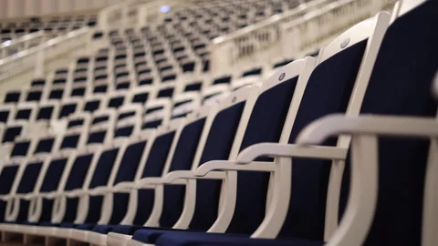 Rows of blue velvet chairs with empty concert hall, philharmonic Stock Footage 312032181