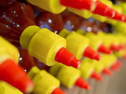 Rows of bottled sauce Stock Photos