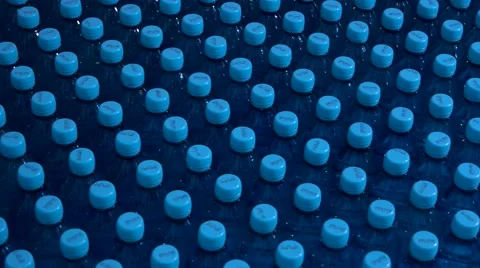 Rows of bottles with water. Video stock 68984697