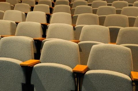 Rows of chairs in auditorium Stock Photos