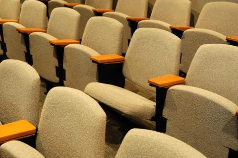 Rows of chairs in auditorium Stock Photos