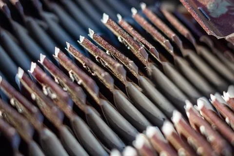 Rows of chocolate bars arranged in a repetitive pattern on a production line 写真素材