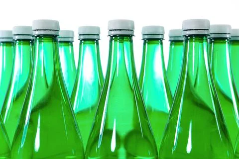 Rows of closed plastic bottles with cap Stock Photos