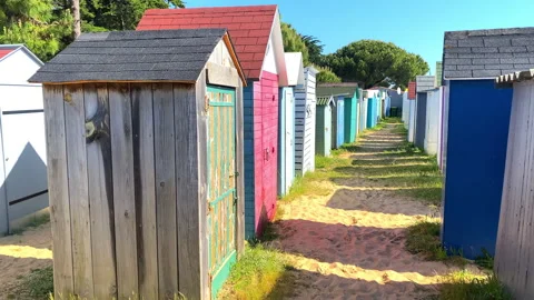 Rows of colored bathing cabins of the beach of La Boirie on Oléron island Video stock 276834431