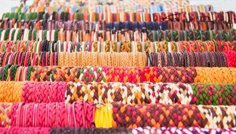 Rows of colorful bracelets Stock Photos