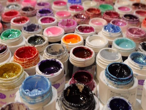 Rows of colorful test specimens of nail polish. Closeup. Shallow depth of field Stock Footage 73397878
