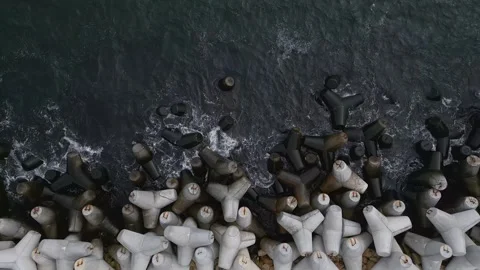 Rows of Concrete Blocks Along Beach Stock Footage 267863280
